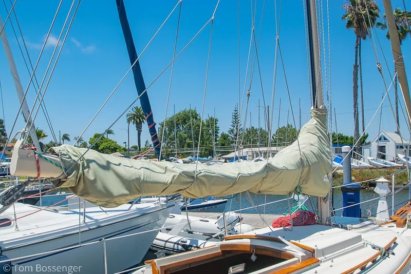 Slide: The Image of Sailboat Pacific Seacraft Flicka 20, 1993 model, docked with covered sail. - 27
