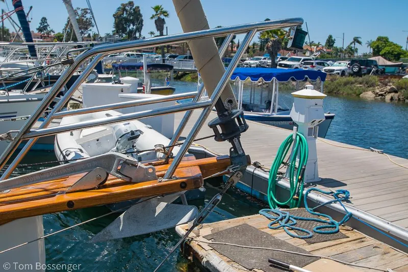Slide: The Image of Docked 1993 Pacific Seacraft Flicka 20 sailboat with anchor and marina view. - 31