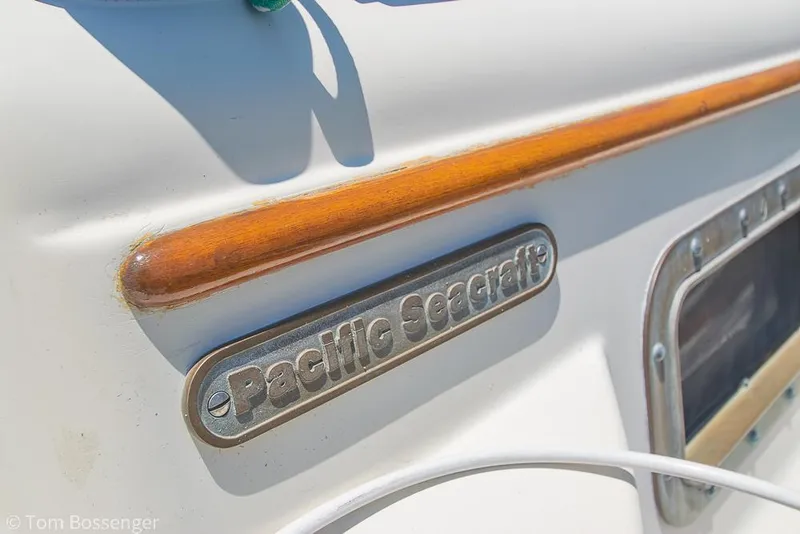 Slide: The Image of Close-up of 1993 Pacific Seacraft Flicka 20 boat nameplate and wooden trim. - 4