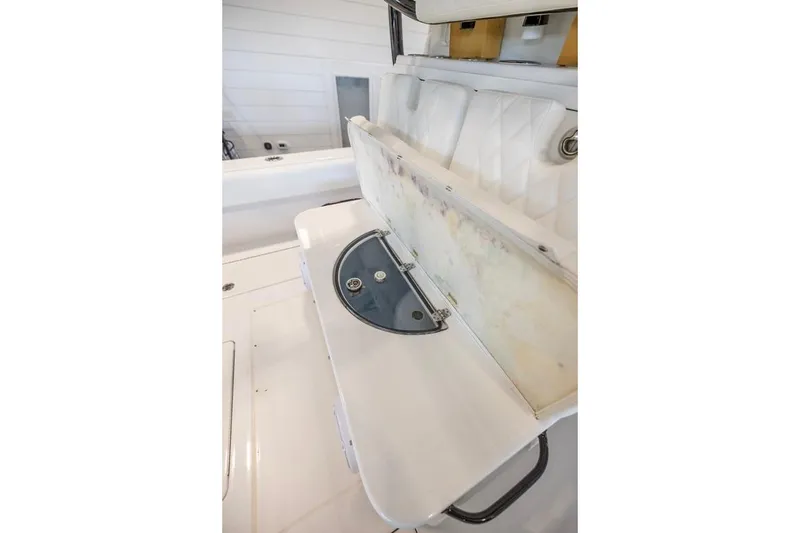 Slide: The Image of 2024 Onslow Bay 37 Tournament boat interior with open storage compartment. - 28