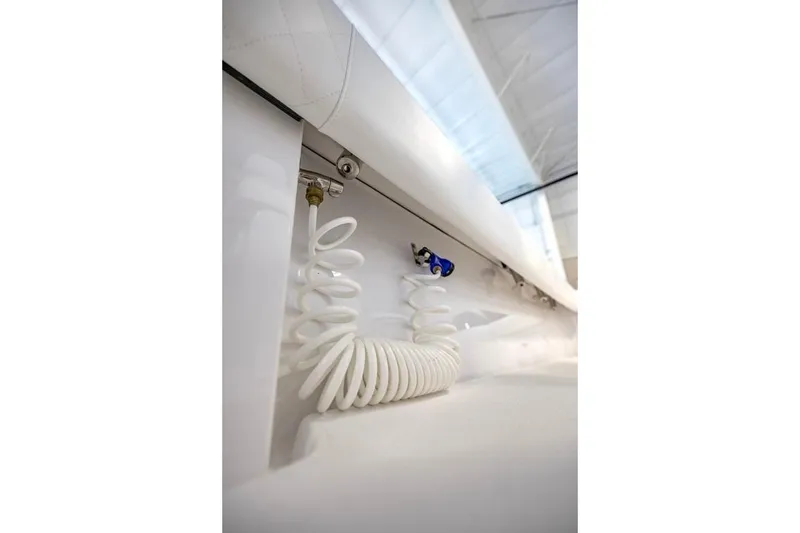 Slide: The Image of Coiled hose detail on 2024 Onslow Bay 37 Tournament boat. - 37