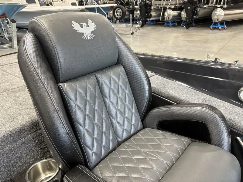 Slide: The Image of Luxurious leather seat in 2025 Phoenix 721 ZXL boat, featuring diamond stitching and logo. - 29