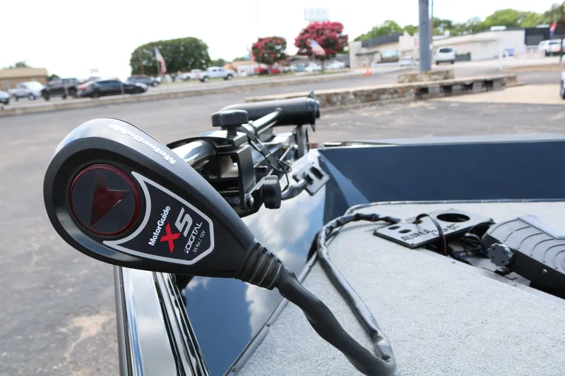 Slide: The Image of 2020 Alumacraft Pro 185 boat with MotorGuide X5 trolling motor in parking lot. - 14