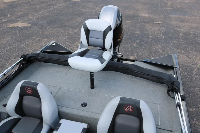 Slide: The Image of 2020 Alumacraft Pro 185 boat interior with seating and motor. - 26