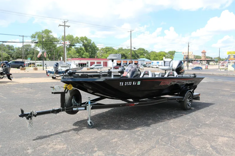 Slide: The Image of 2020 Alumacraft Pro 185 boat on trailer in parking lot, sunny day. - 3