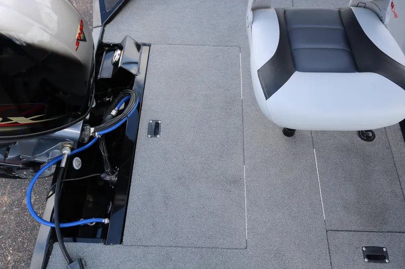 Slide: The Image of 2020 Alumacraft Pro 185 boat interior with motor and seating detail. - 33