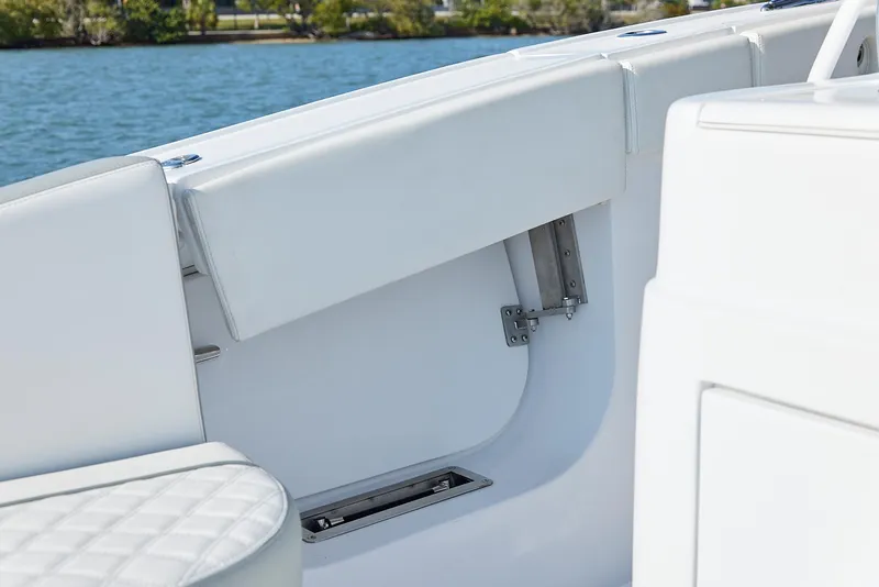 Slide: The Image of Interior view of 2021 Midnight Express 43' Open boat, featuring white seating and sleek design. - 17