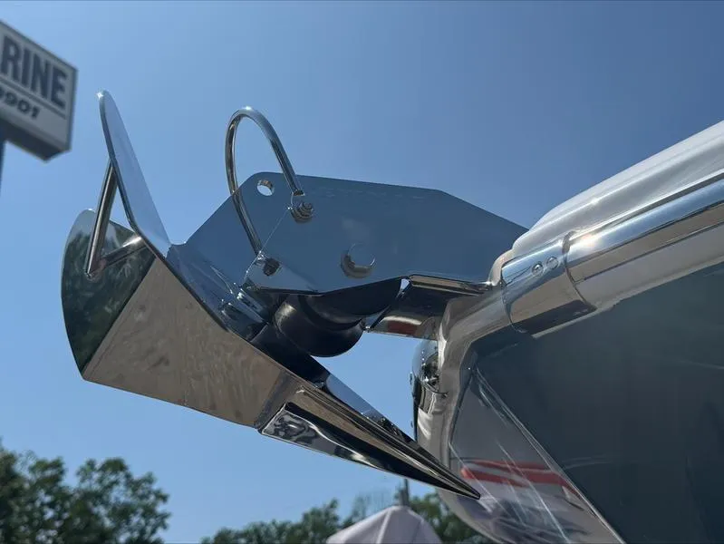 Slide: The Image of Close-up of a 2025 Edgewater 248CX boat anchor against a clear blue sky. - 13