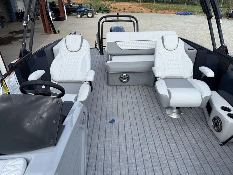 Slide: The Image of Interior of 2025 Godfrey Monaco 235 SFL boat with luxurious seating and modern design. - 10