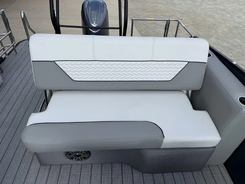 Slide: The Image of 2025 Godfrey Monaco 235 SFL iMPACT boat seat with stylish gray and white upholstery. - 14
