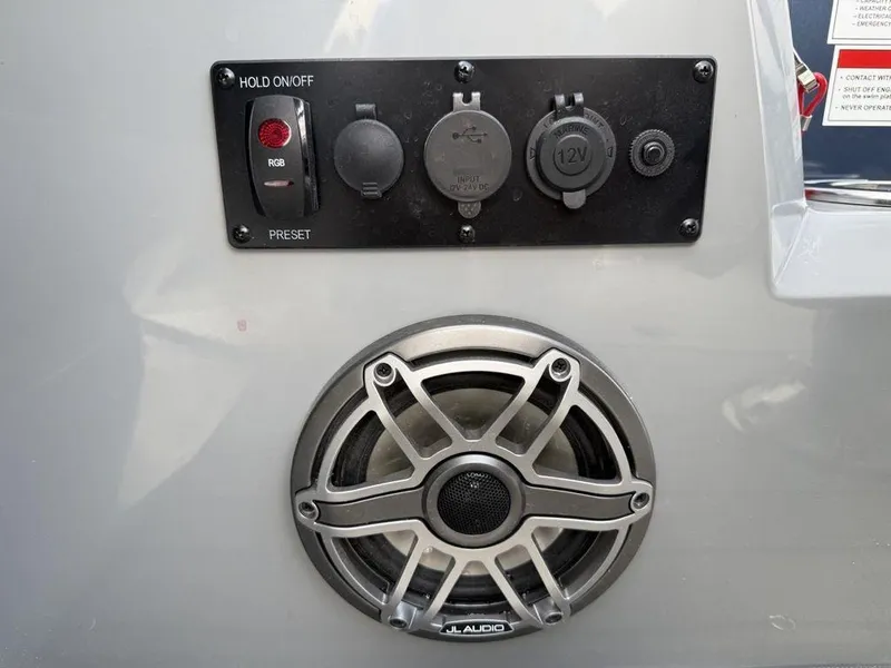 Slide: The Image of Control panel and speaker on 2025 Godfrey Monaco 235 SFL iMPACT boat. - 16