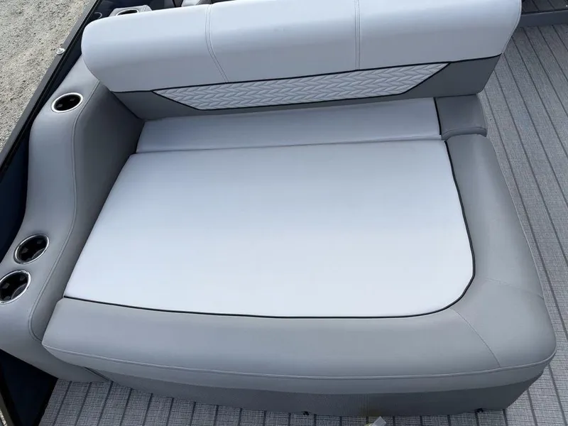 Slide: The Image of 2025 Godfrey Monaco 235 SFL iMPACT boat seating with cup holders and stylish upholstery. - 21