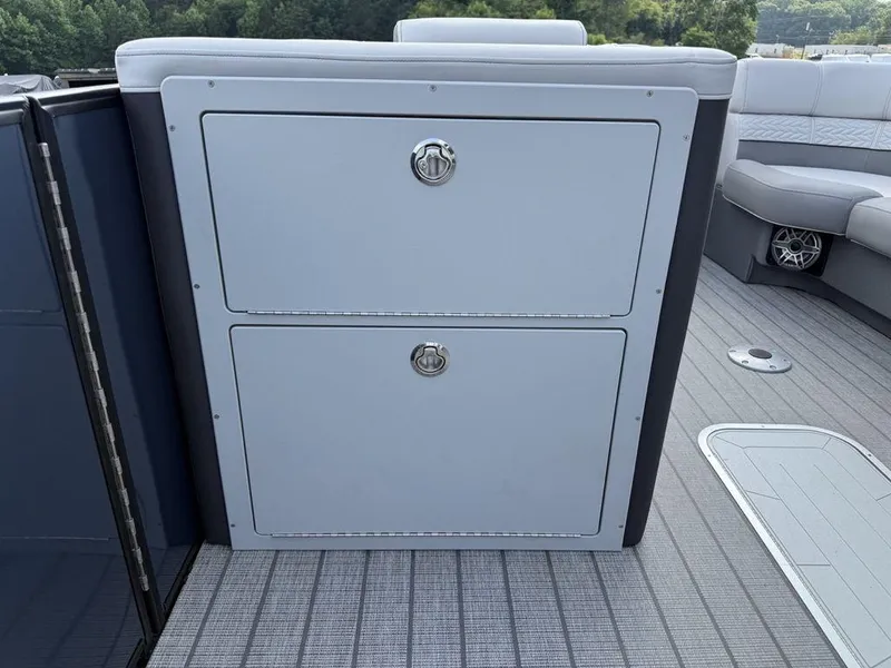 Slide: The Image of Storage compartment on 2025 Godfrey Monaco 235 SFL iMPACT pontoon boat, featuring sleek design and modern finishes. - 23