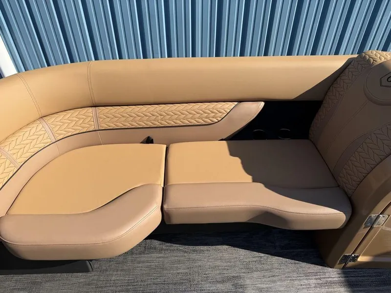 Slide: The Image of Luxurious tan seating on 2025 Godfrey Monaco 235 SFL iMPACT pontoon boat. - 10