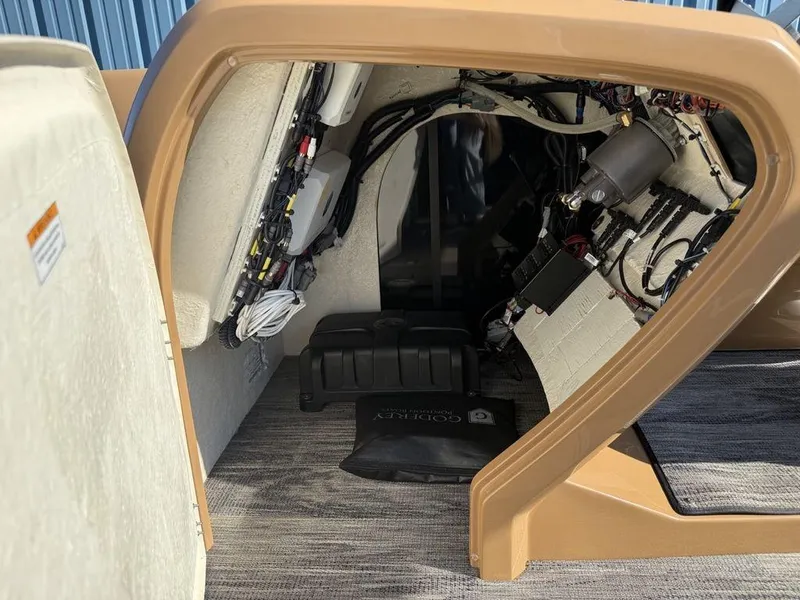 Slide: The Image of Interior view of 2025 Godfrey Monaco 235 SFL iMPACT Package boat wiring and components. - 27