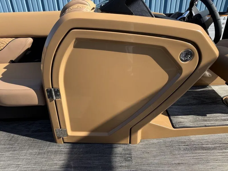 Slide: The Image of 2025 Godfrey Monaco 235 SFL iMPACT Package, tan interior door detail. - 28