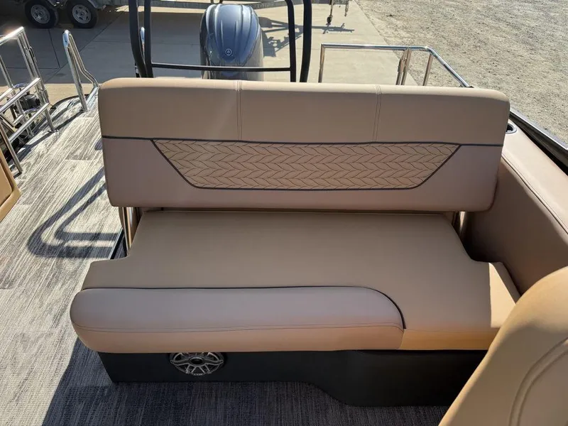 Slide: The Image of 2025 Godfrey Monaco 235 SFL iMPACT boat with beige seating and stylish design. - 29