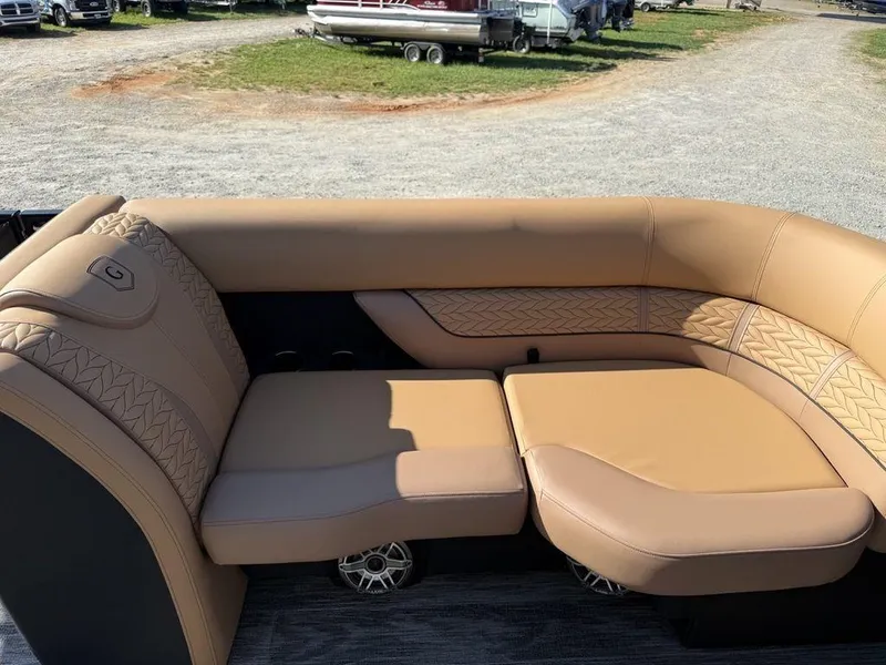 Slide: The Image of Luxurious tan seating on 2025 Godfrey Monaco 235 SFL iMPACT pontoon boat. - 3