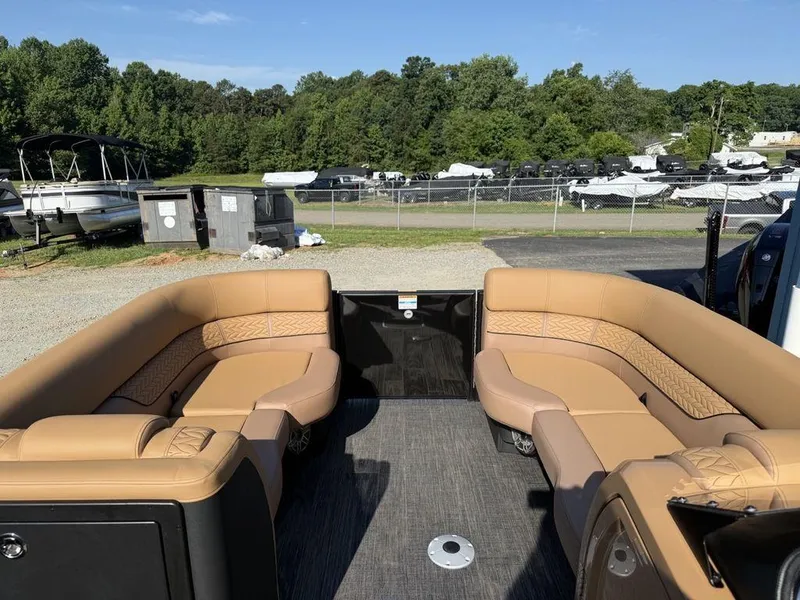 Slide: The Image of Luxurious seating on 2025 Godfrey Monaco 235 SFL iMPACT pontoon boat, parked outdoors. - 6