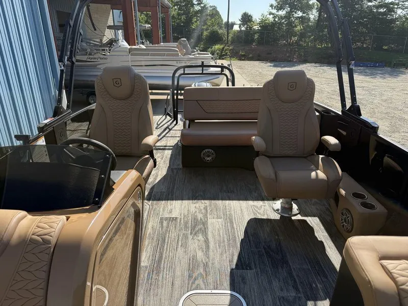 Slide: The Image of Luxurious interior of 2025 Godfrey Monaco 235 SFL iMPACT pontoon boat with plush seating. - 9