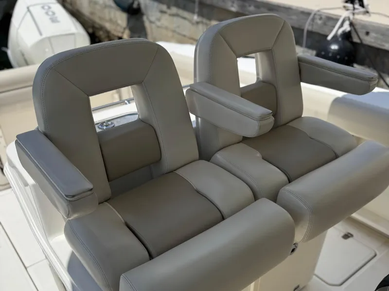 Slide: The Image of Luxury seating on 2020 Boston Whaler 280 Outrage boat, featuring plush, ergonomic design. - 28