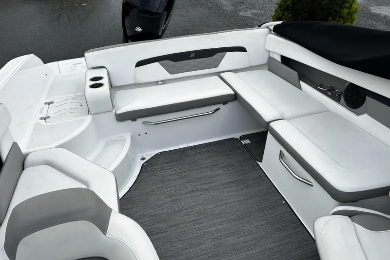 Slide: The Image of 2021 Four Winns HD2 OB boat interior with white seating and modern design. - 14