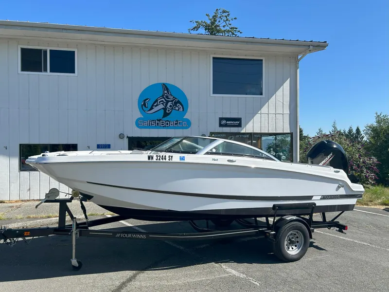 Slide: The Image of 2021 Four Winns HD2 OB boat on trailer outside Salish Boat Co. building. - 2