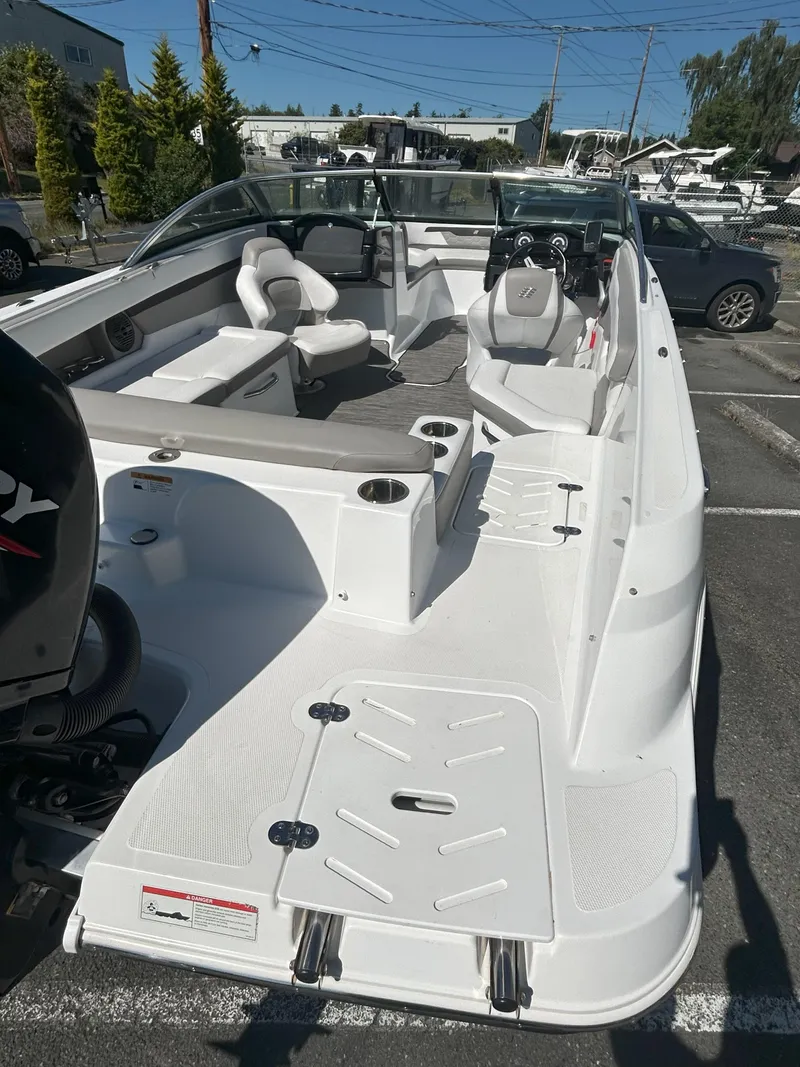 Slide: The Image of 2021 Four Winns HD2 OB boat with spacious seating and modern design. - 4