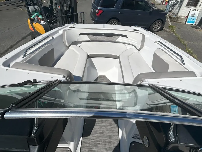 Slide: The Image of 2021 Four Winns HD2 OB boat interior with spacious seating and modern design. - 6