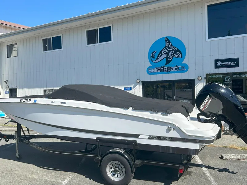 Slide: The Image of 2021 Four Winns HD2 OB boat with cover, parked outside Salish Boat Co. - 9