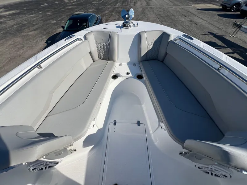 Slide: The Image of 2026 Wellcraft 243 Fisherman boat interior with spacious seating and modern design. - 20