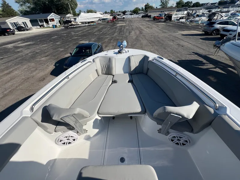 Slide: The Image of 2026 Wellcraft 243 Fisherman boat interior with spacious seating and modern design. - 21