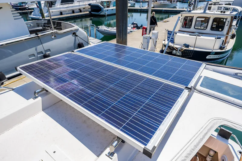 Slide: The Image of Solar panels on a 2021 Ranger Tugs R-31 CB boat docked at a marina. - 20