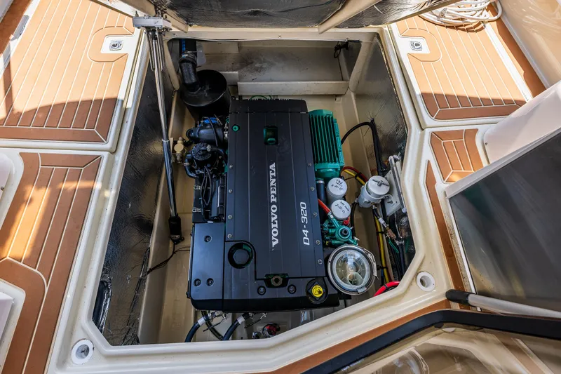 Slide: The Image of Engine compartment of 2021 Ranger Tugs R-31 CB with Volvo Penta D4-320 engine. - 46