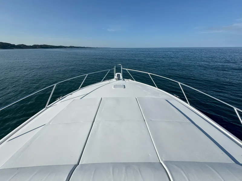 Slide: The Image of Bow view of 2007 Viking 52 Open yacht on calm sea. - 10