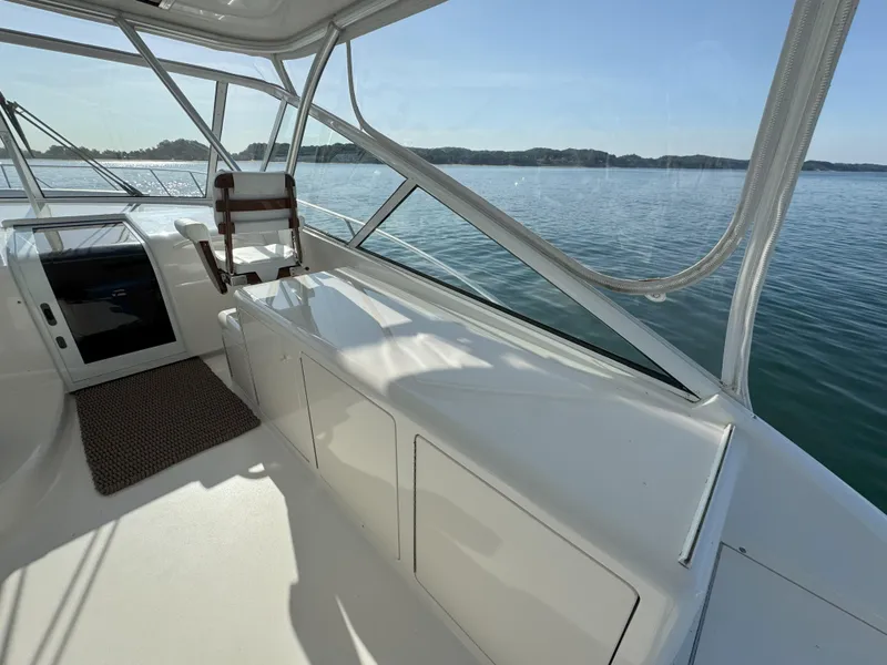 Slide: The Image of 2007 Viking 52 Open yacht interior with panoramic water view. - 21