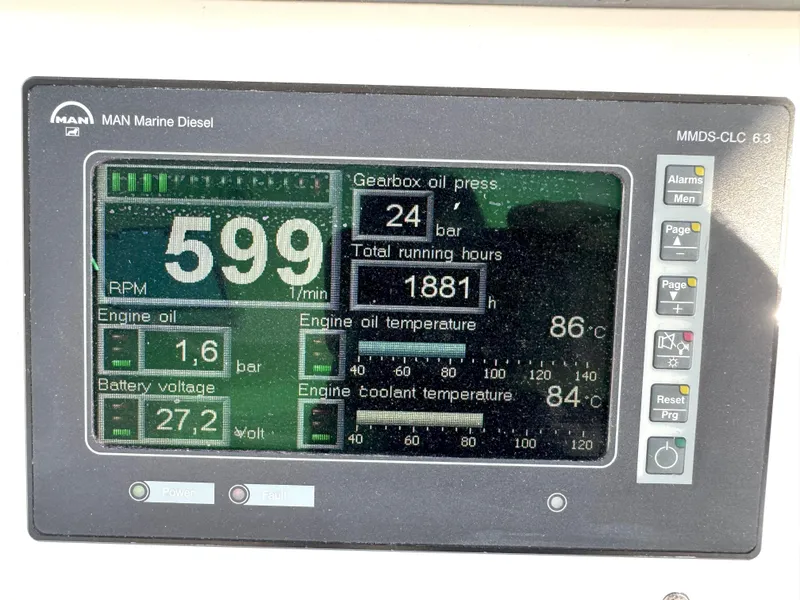 Slide: The Image of MAN Marine Diesel engine display showing RPM, oil pressure, and temperatures on a 2007 Viking 52 Open. - 31