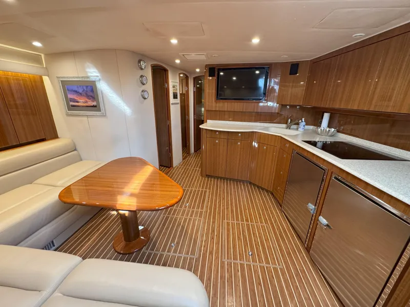 Slide: The Image of Luxurious interior of 2007 Viking 52 Open yacht with wood finishes and modern amenities. - 33