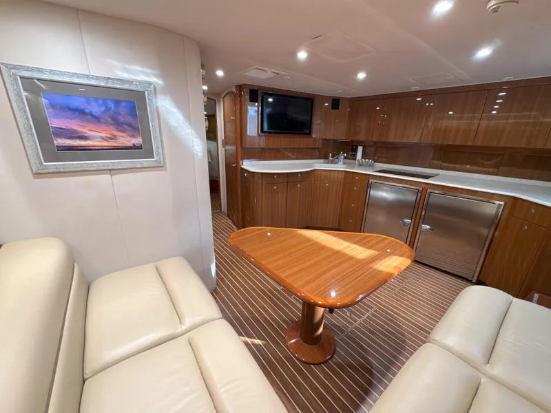 Slide: The Image of Luxurious interior of 2007 Viking 52 Open yacht with elegant wood finishes and modern amenities. - 38