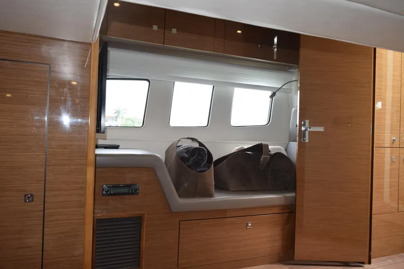 Slide: The Image of Luxurious interior of 2018 Cruisers Yachts 45 Cantius with modern wood finish. - 14