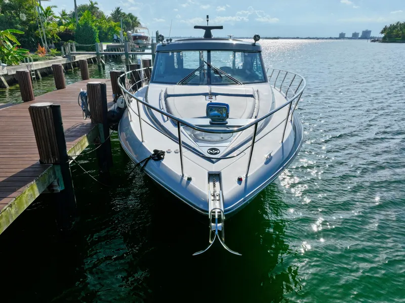 Slide: The Image of 2018 Cruisers Yachts 45 Cantius docked on a sunny waterfront. - 27