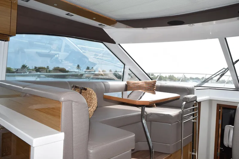 Slide: The Image of Luxurious interior of 2018 Cruisers Yachts 45 Cantius with elegant seating and table. - 3