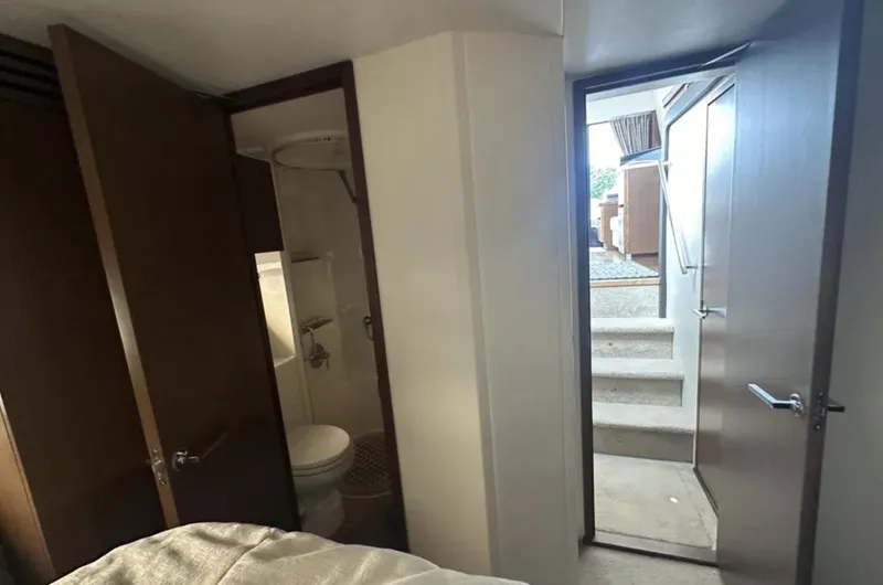 Slide: The Image of Luxurious interior seating of 2018 Sea Ray Sundancer 400 yacht, featuring elegant embroidery. - 11