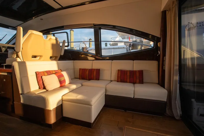 Slide: The Image of Luxurious interior of 2018 Sea Ray Sundancer 400 yacht with plush seating and cushions. - 14