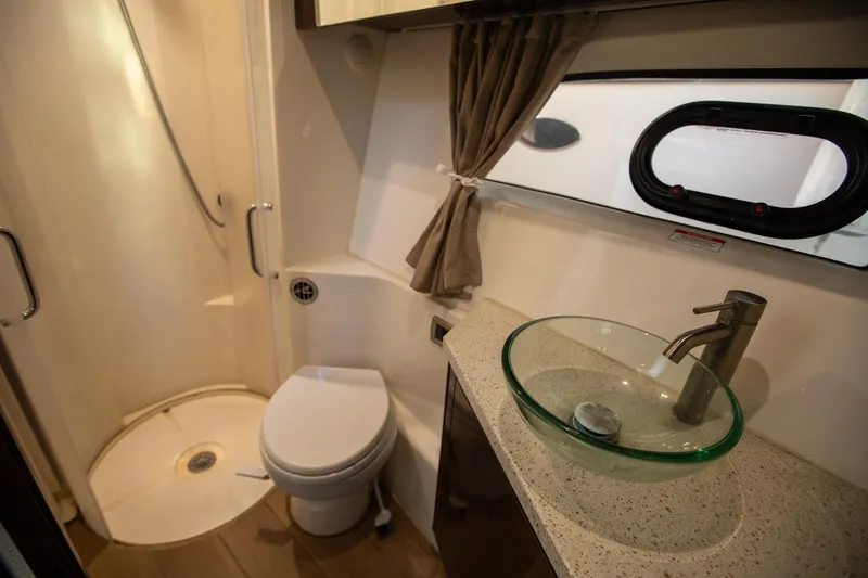 Slide: The Image of Luxurious bathroom in 2018 Sea Ray Sundancer 400 yacht with modern fixtures. - 19