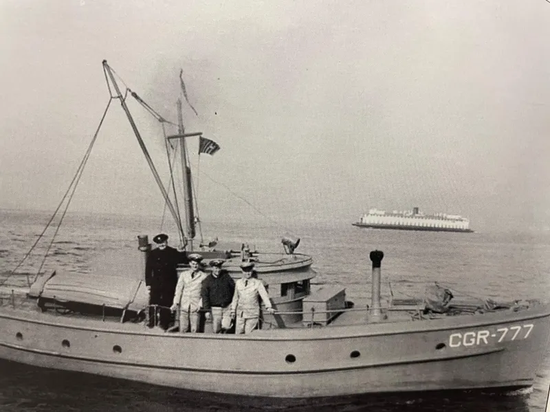 Slide: The Image of Vintage Blanchard Dunlin 42 boat with crew, 1920, at sea with distant ship. - 19