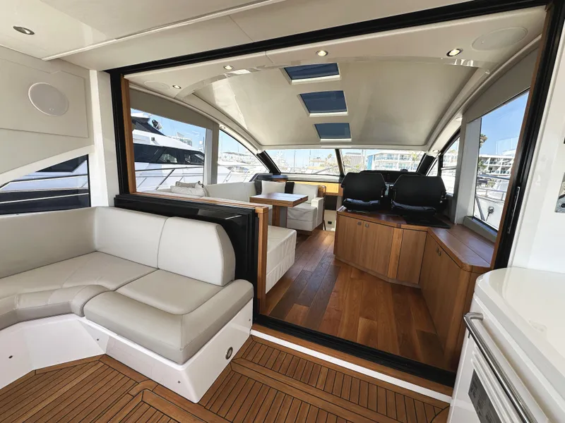 Slide: The Image of Luxurious interior of 2019 Sunseeker Predator 57 yacht with elegant seating and wood flooring. - 10