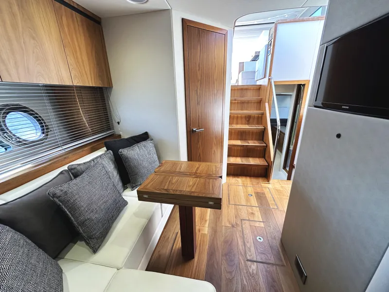 Slide: The Image of Interior of 2019 Sunseeker Predator 57 yacht with wooden finishes and modern design. - 41