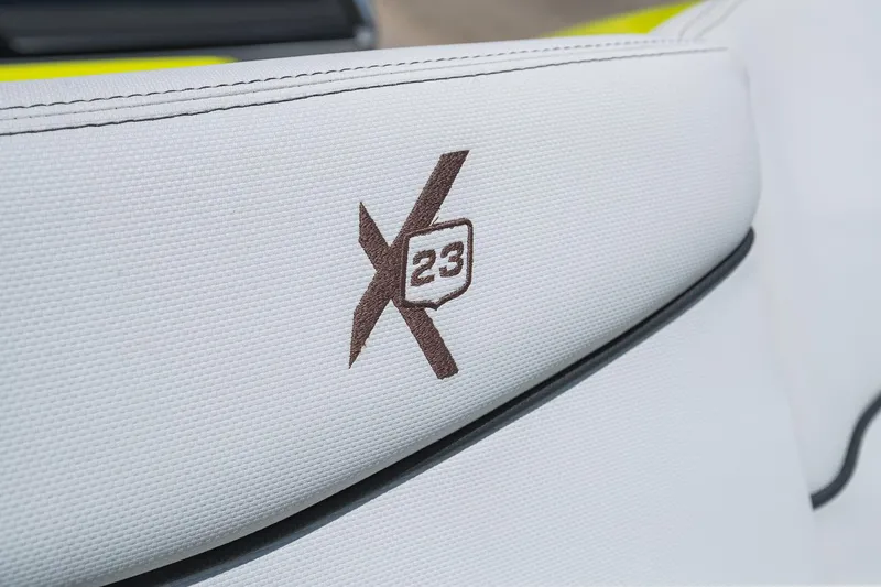 Slide: The Image of Close-up of 2018 MasterCraft X23 logo on white upholstery. - 10