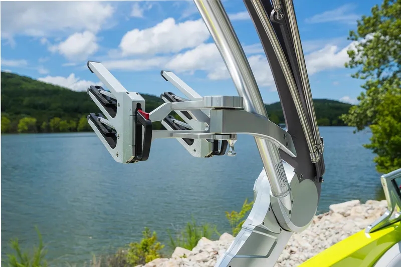 Slide: The Image of 2018 MasterCraft X23 wakeboard rack by a scenic lake. - 31